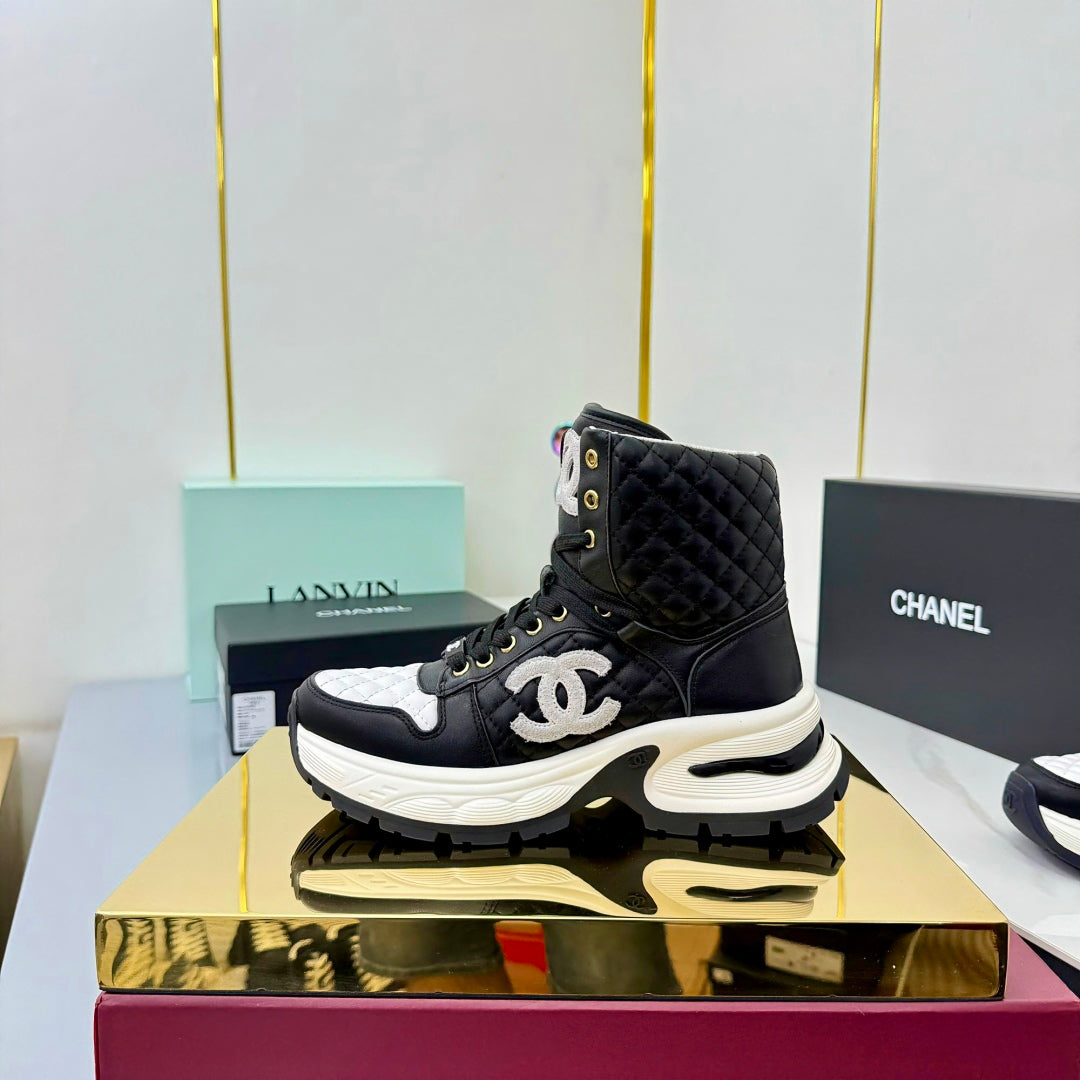 Chanel 2025 Quilted High-Top Sneakers Black White Cowhide 469789