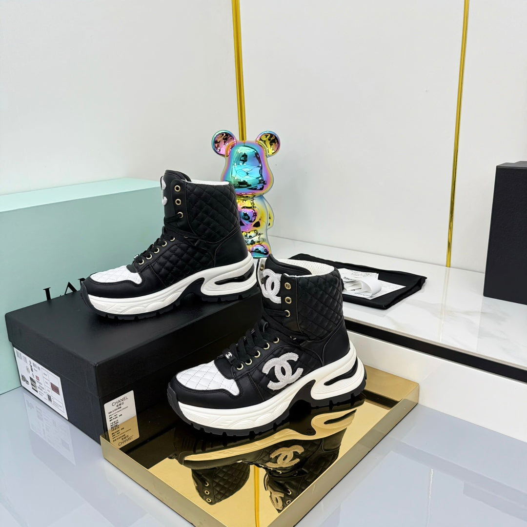 Chanel 2025 Quilted High-Top Sneakers Black White Cowhide 469789