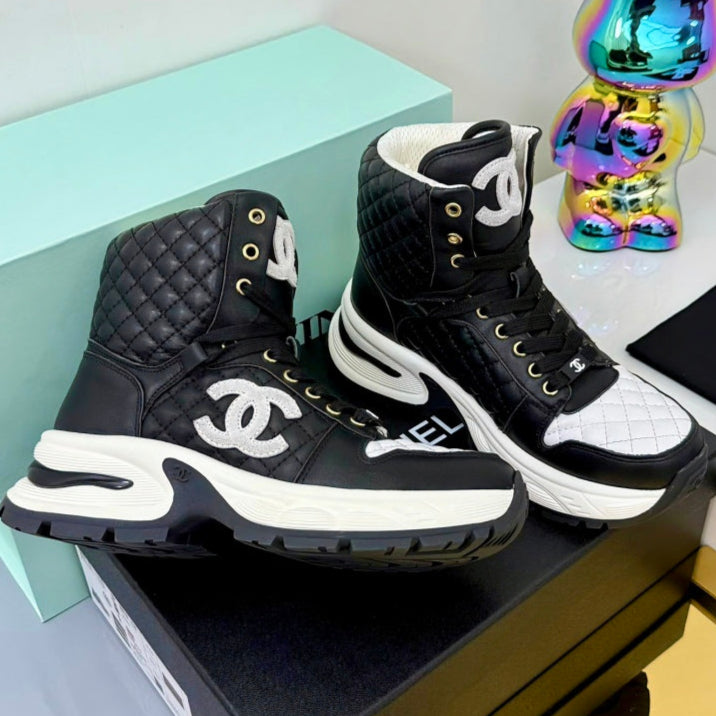 Chanel 2025 Quilted High-Top Sneakers Black White Cowhide 469789