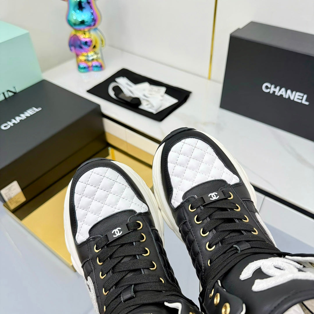 Chanel 2025 Quilted High-Top Sneakers Black White Cowhide 469789