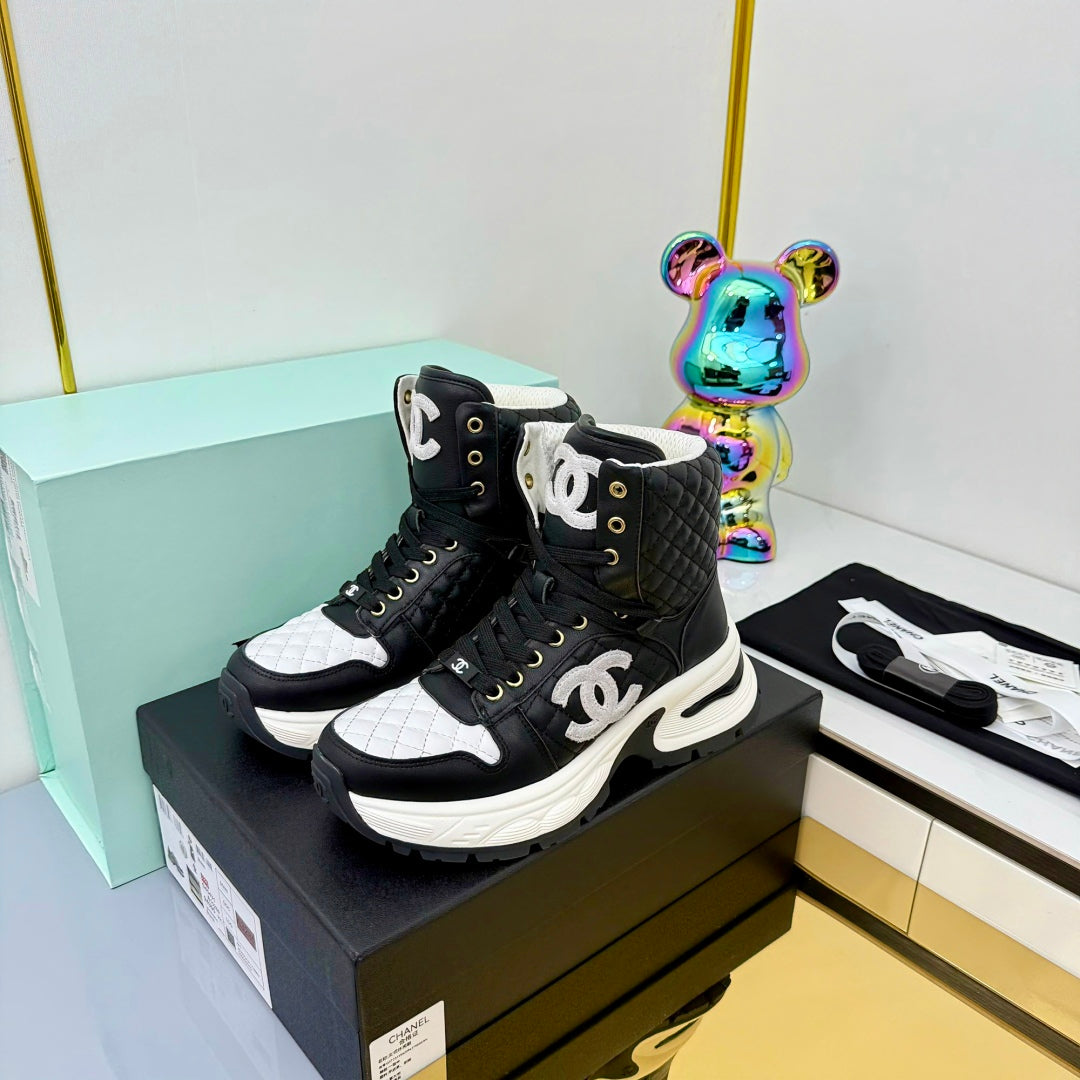 Chanel 2025 Quilted High-Top Sneakers Black White Cowhide 469789