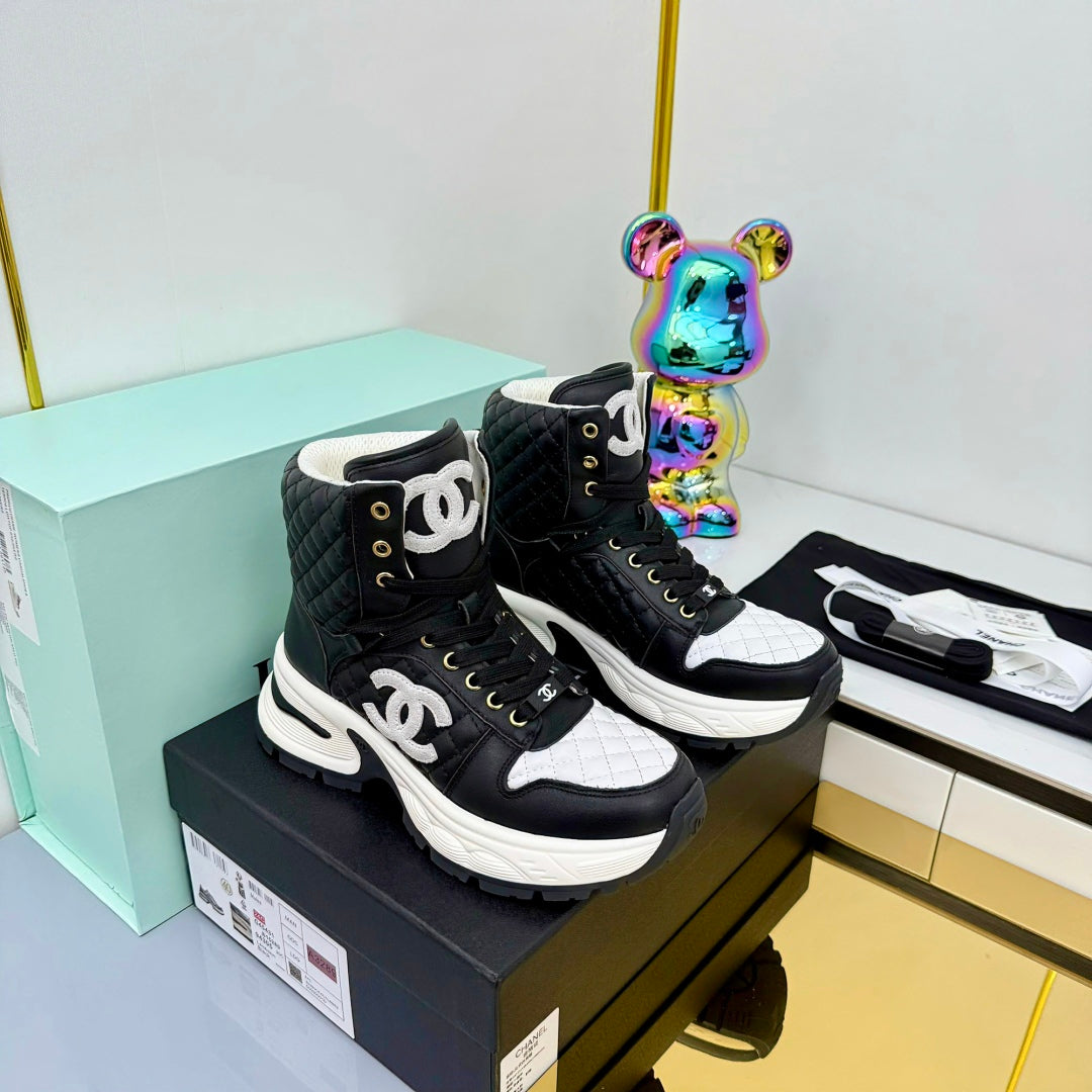 Chanel 2025 Quilted High-Top Sneakers Black White Cowhide 469789