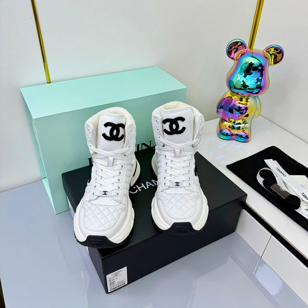 Chanel 2025 Quilted High-Top Sneakers White Black Cowhide 469790