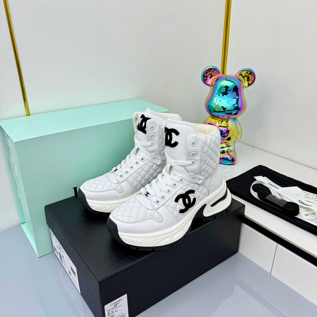 Chanel 2025 Quilted High-Top Sneakers White Black Cowhide 469790