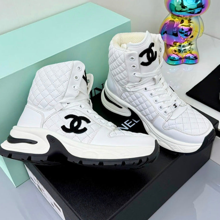 Chanel 2025 Quilted High-Top Sneakers White Black Cowhide 469790
