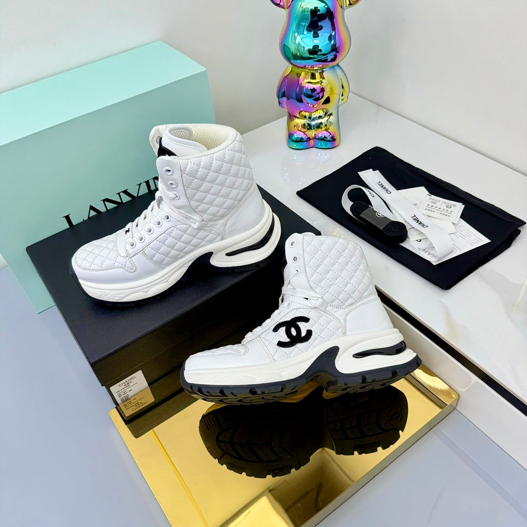 Chanel 2025 Quilted High-Top Sneakers White Black Cowhide 469790