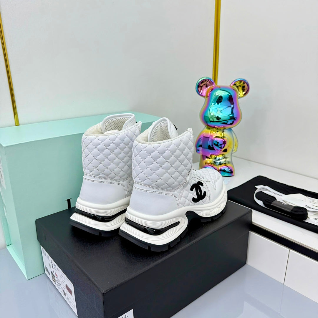 Chanel 2025 Quilted High-Top Sneakers White Black Cowhide 469790