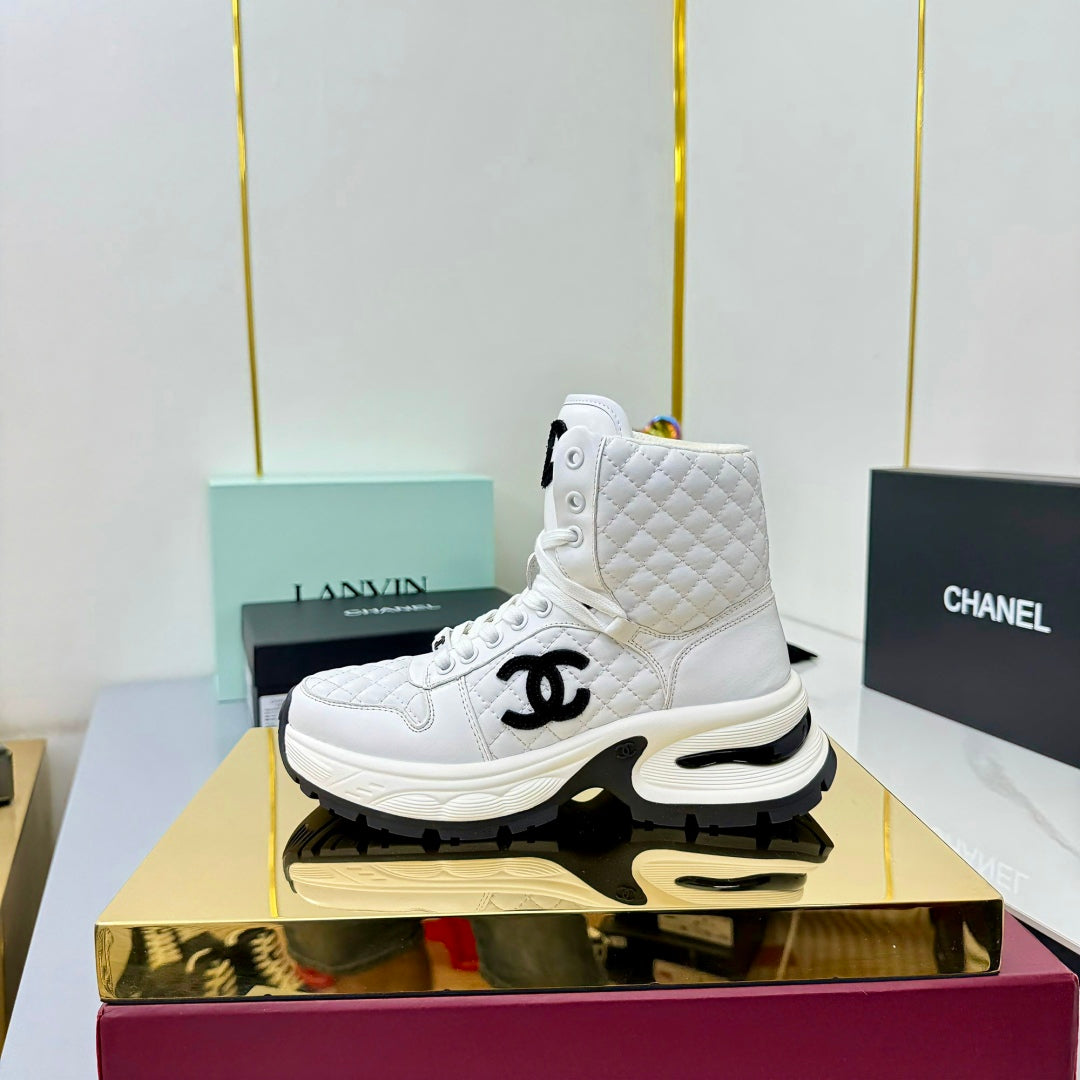 Chanel 2025 Quilted High-Top Sneakers White Black Cowhide 469790