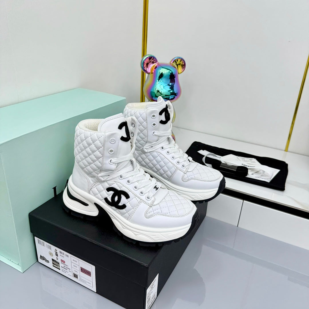 Chanel 2025 Quilted High-Top Sneakers White Black Cowhide 469790