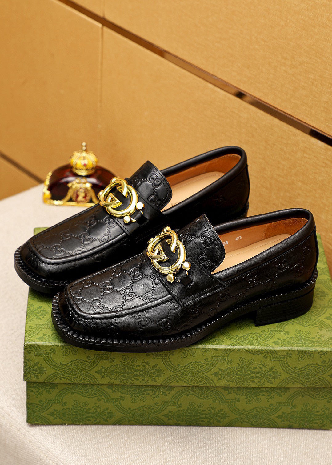 GG Men's Loafer Black GG Gold Embossed Cowhide 736976