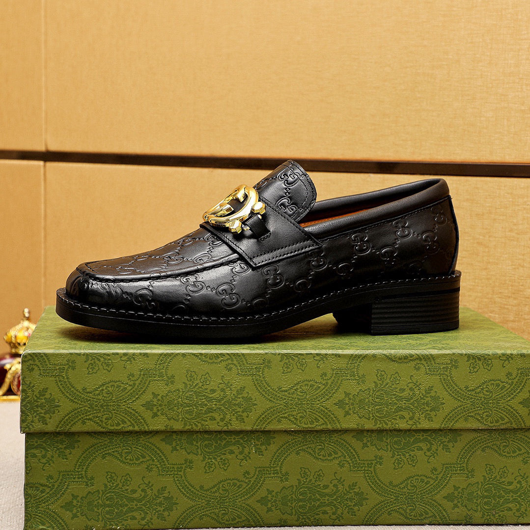 GG Men's Loafer Black GG Gold Embossed Cowhide 736976
