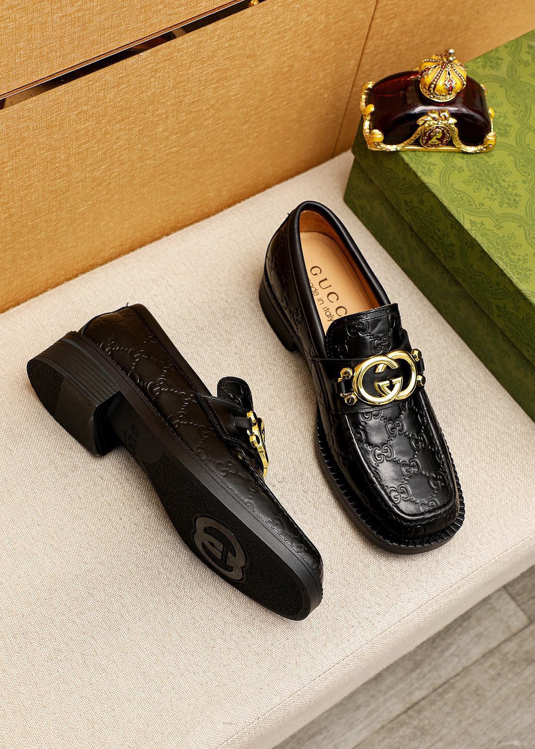 GG Men's Loafer Black GG Gold Embossed Cowhide 736976