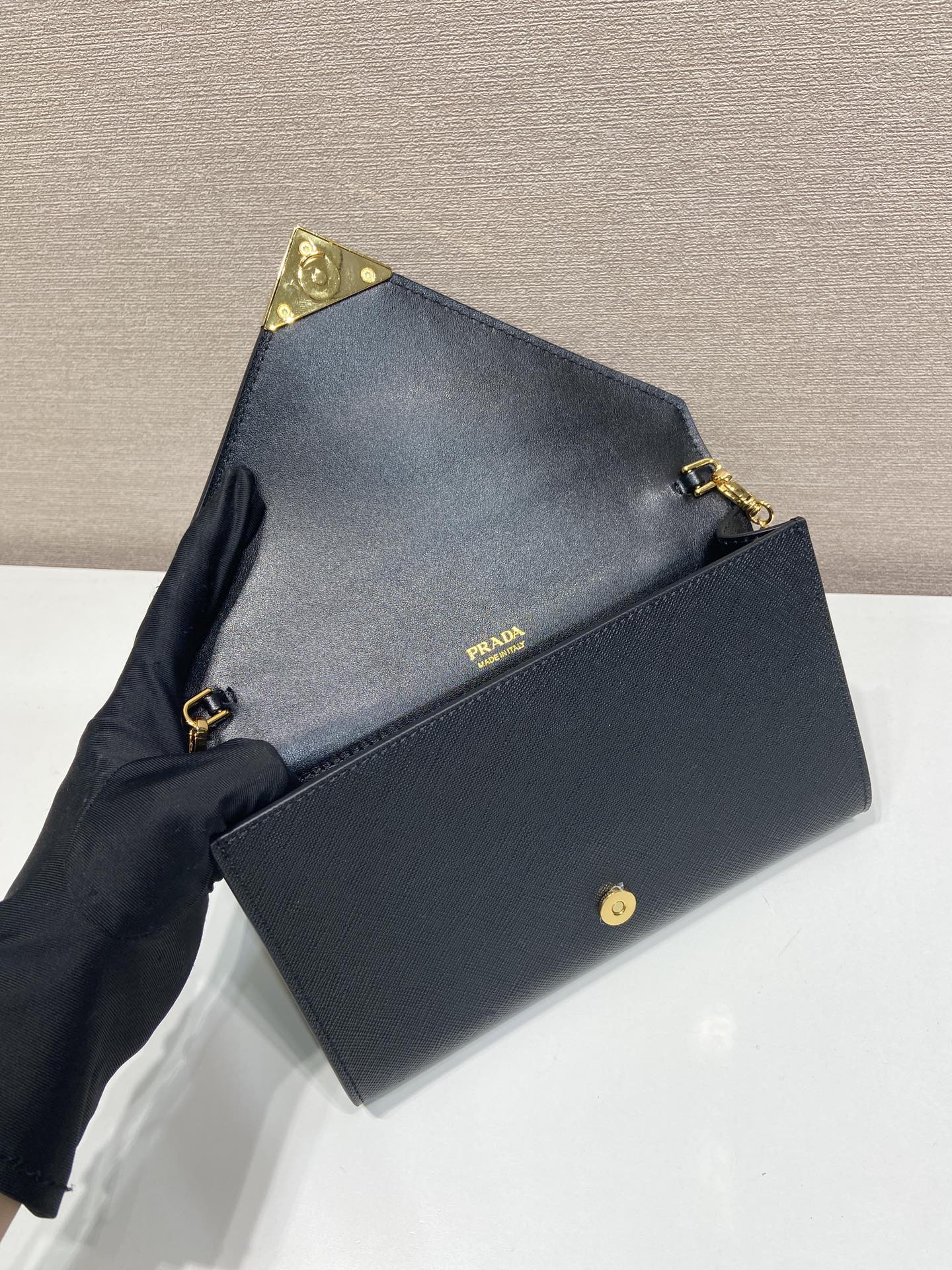 PRA Cross pattern envelope bag black leather 341148
