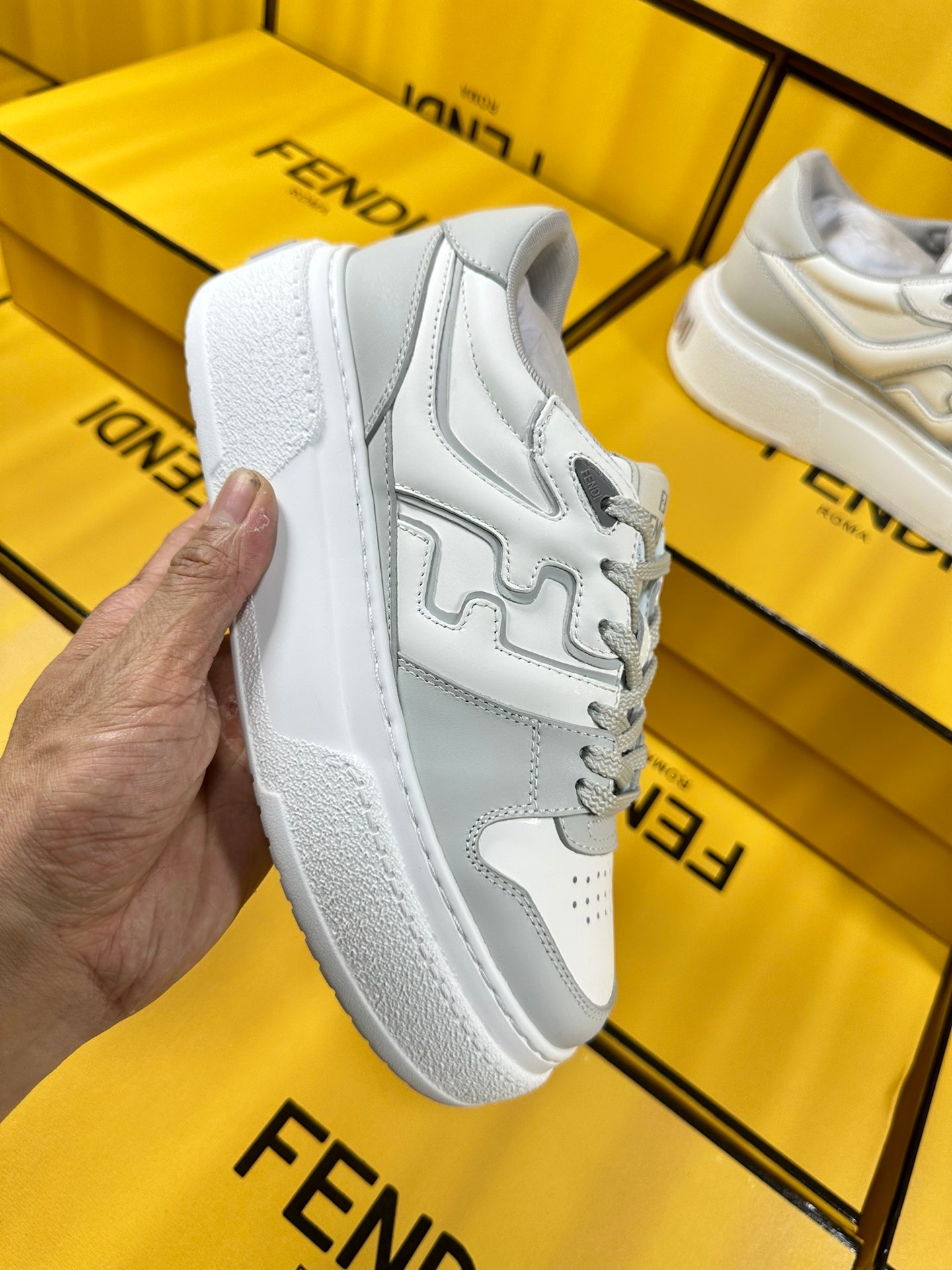 FENDI THICK-SOLDED SNEAKER IN WHITE MIX GREY LAMBSKIN