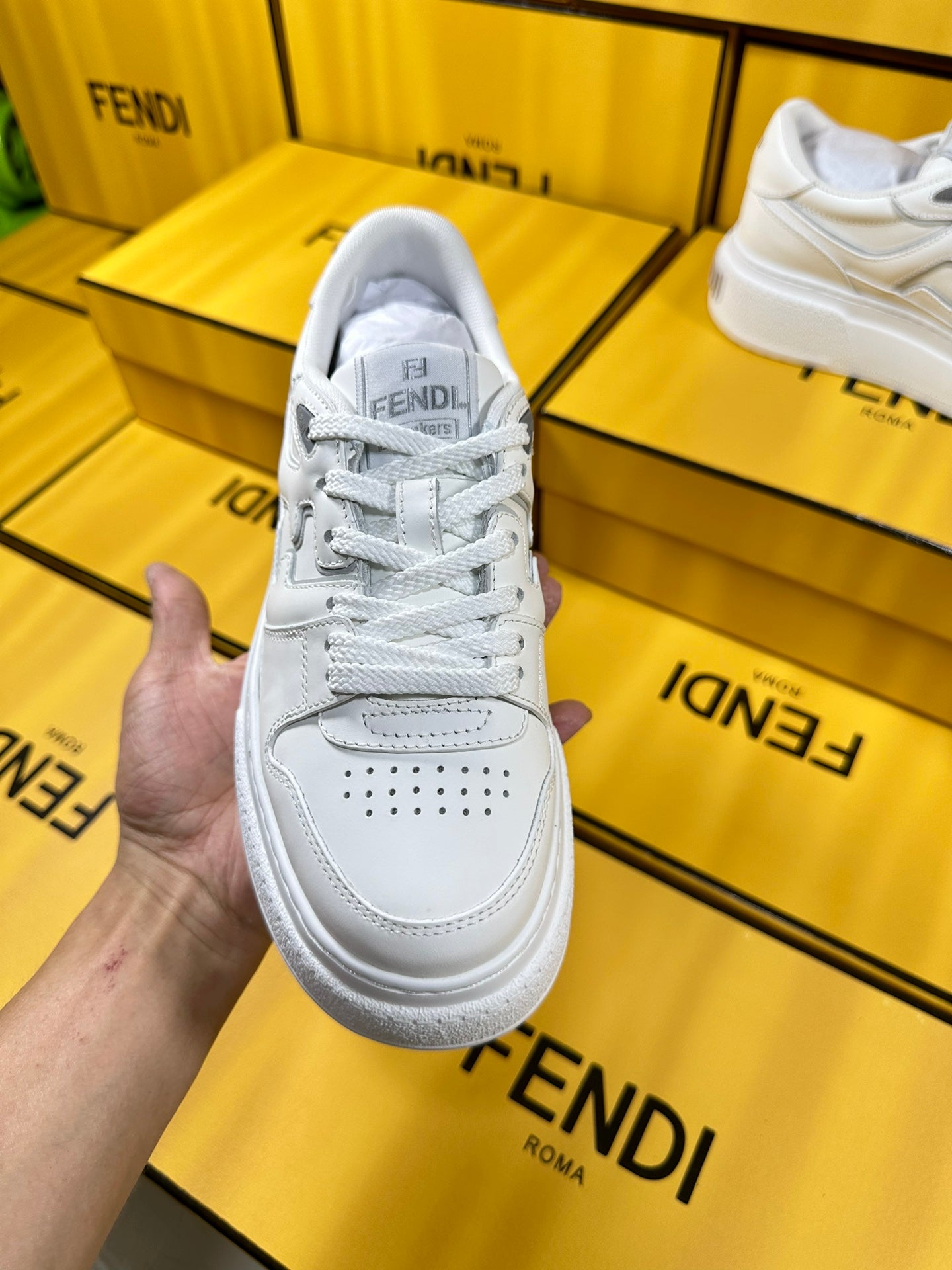 FENDI THICK-SOLDED SNEAKER IN WHITE LAMBSKIN