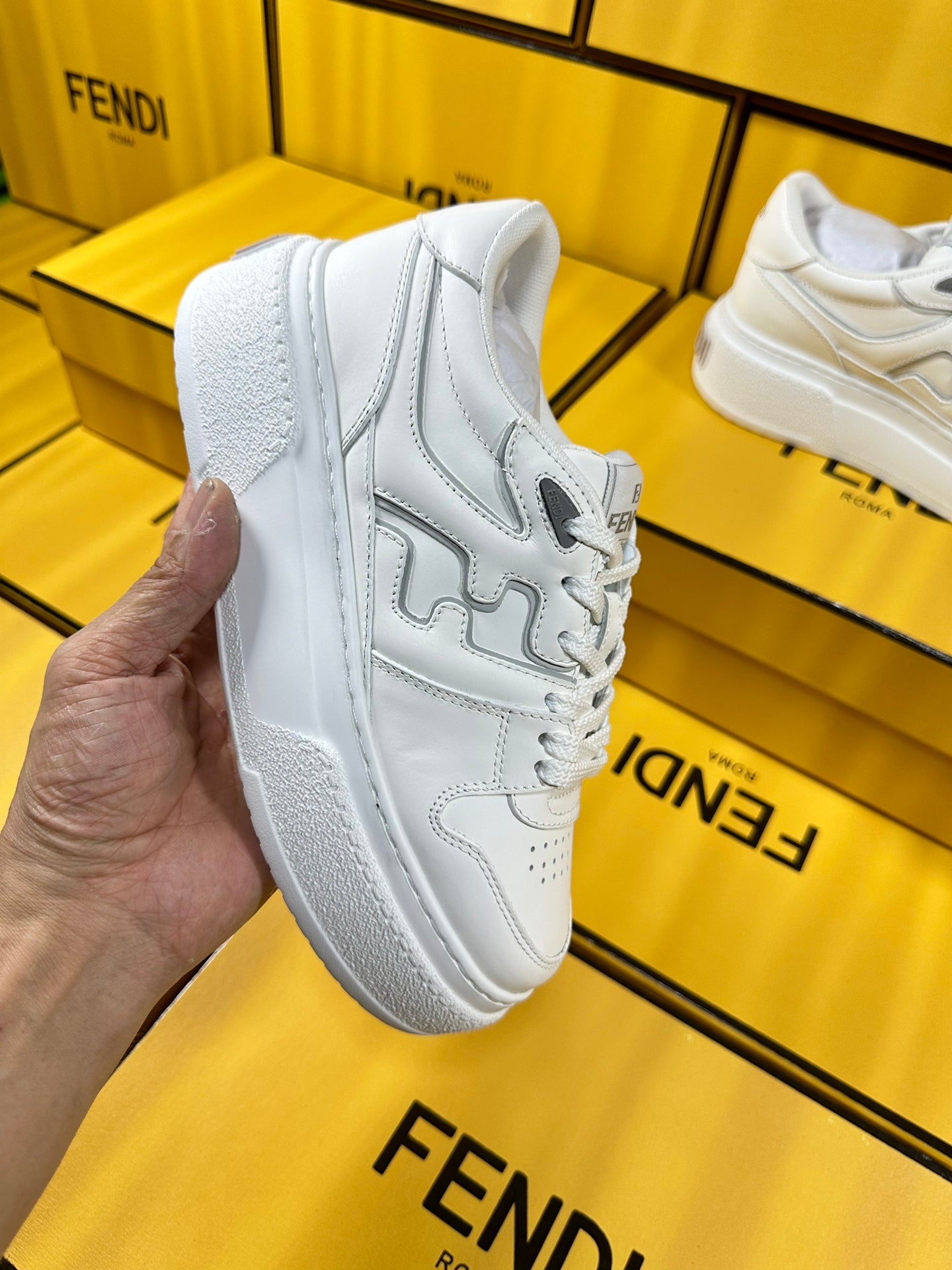 FENDI THICK-SOLDED SNEAKER IN WHITE LAMBSKIN