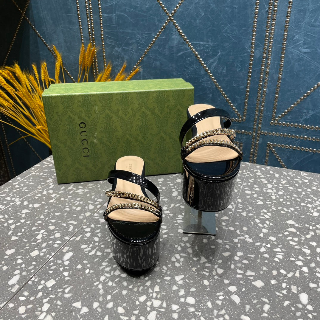 HIGH WEDGE PLATFORM IN BLACK CALFSKIN WITH GOLD HARDWARE