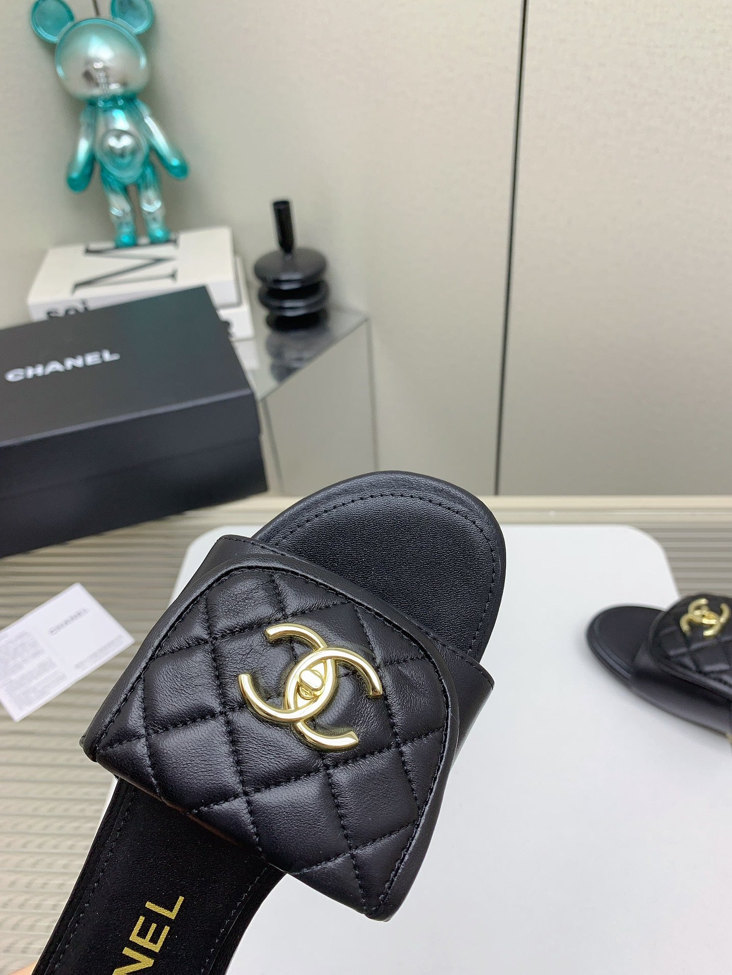 CC Slippers In Black Quilted Lambskin 148959