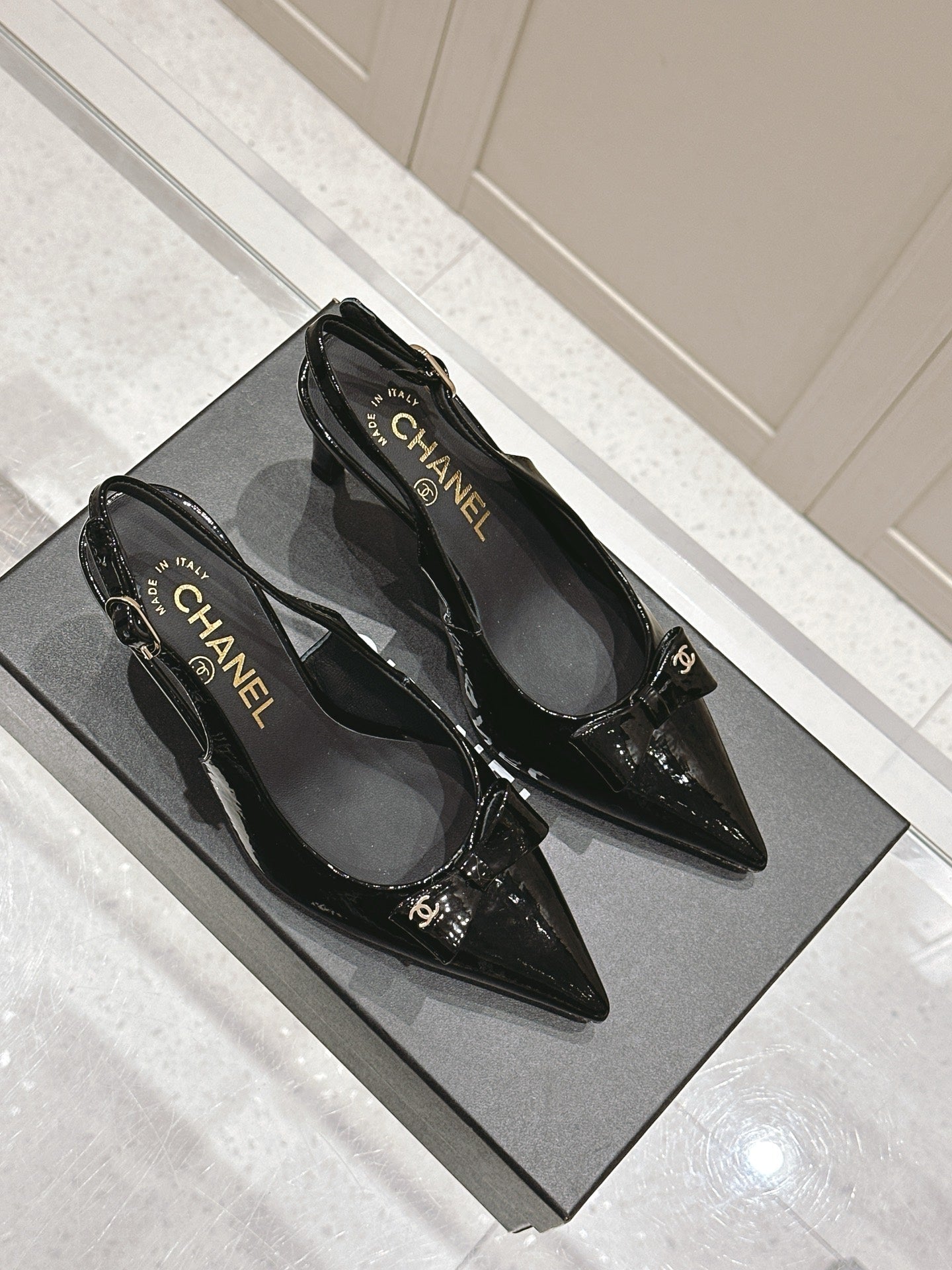 Chanel 25A Slingback Black Patent  Calfskin 393073