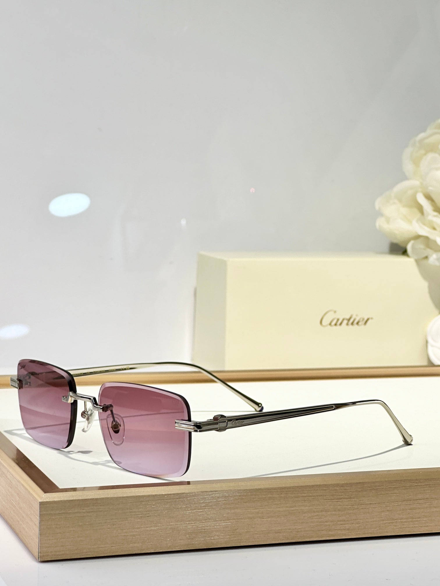 C DE RIMLESS SQUARE FRAME SUNGLASSES CT0610S IN METAL