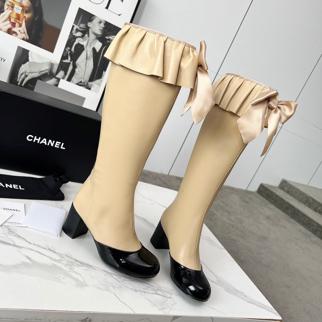 CC 25 high boots beige black sheepskin 459456