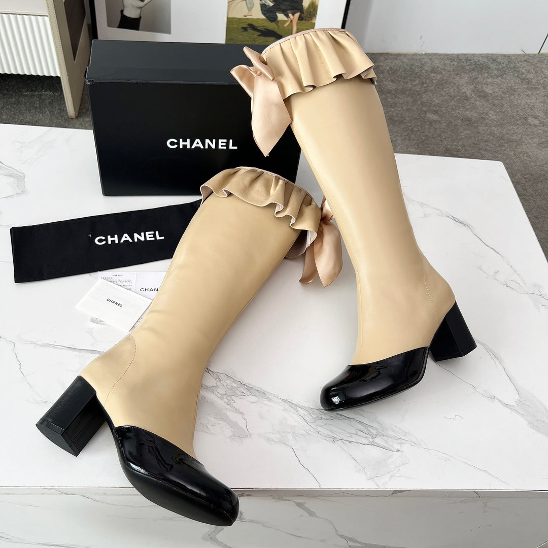 CC 25 high boots beige black sheepskin 459456