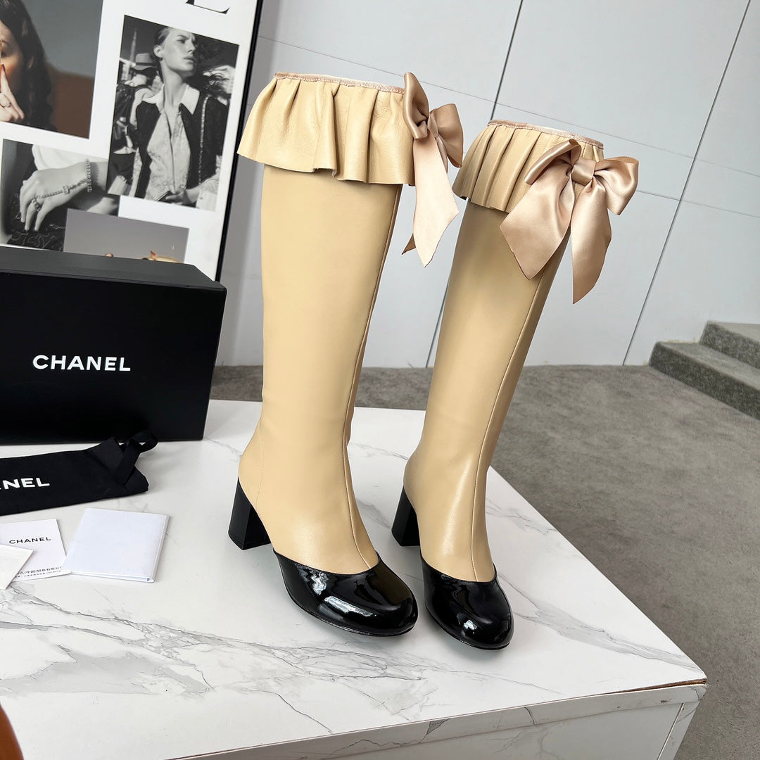 CC 25 high boots beige black sheepskin 459456