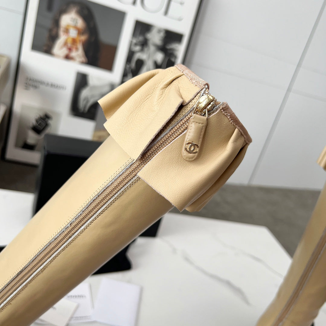 CC 25 high boots beige black sheepskin 459456