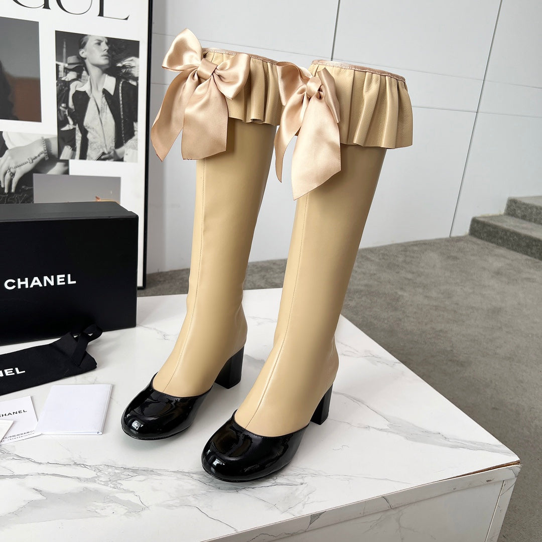 CC 25 high boots beige black sheepskin 459456