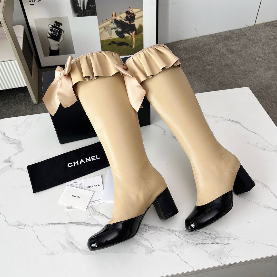 CC 25 high boots beige black sheepskin 459456