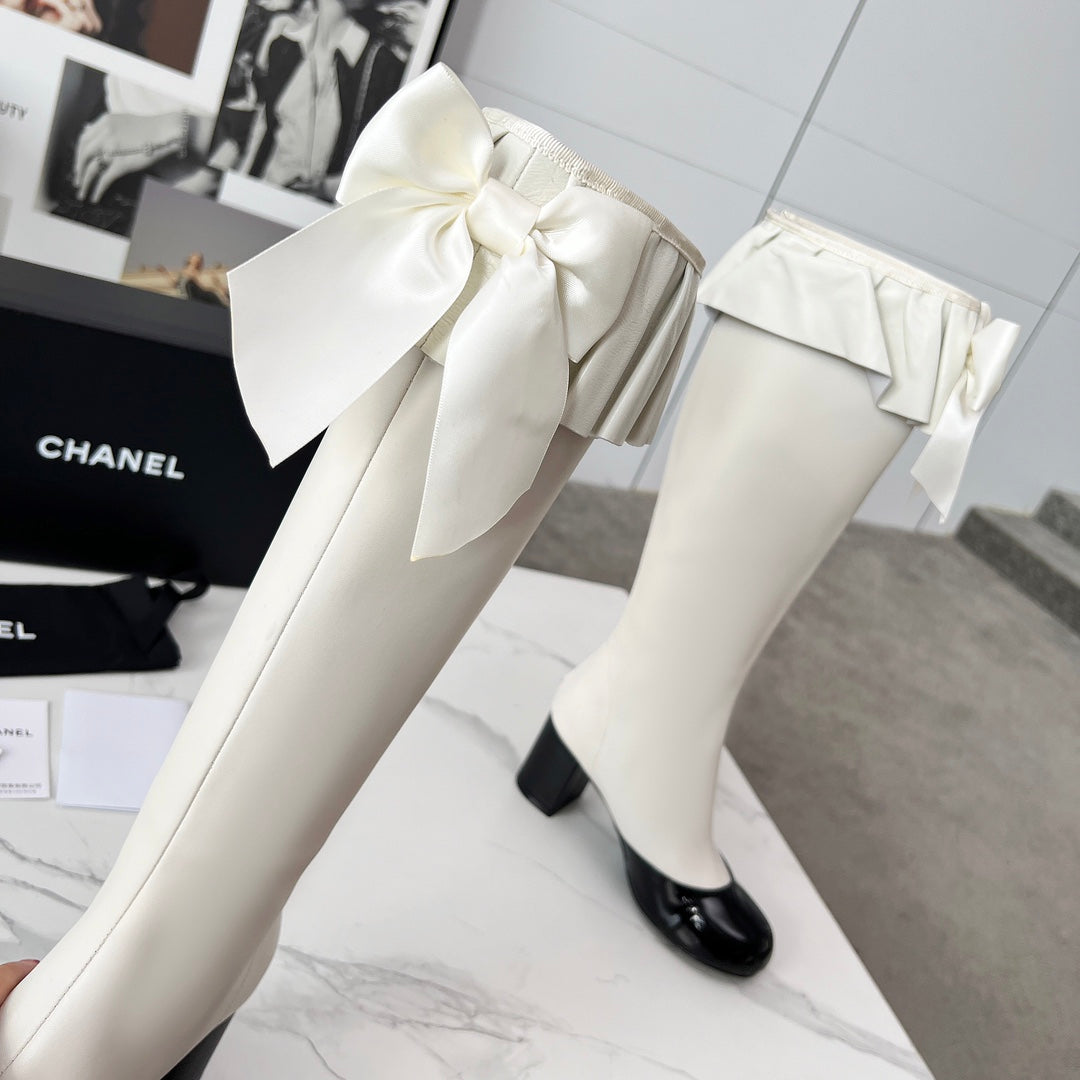 CC 25 high boots white black sheepskin 459457