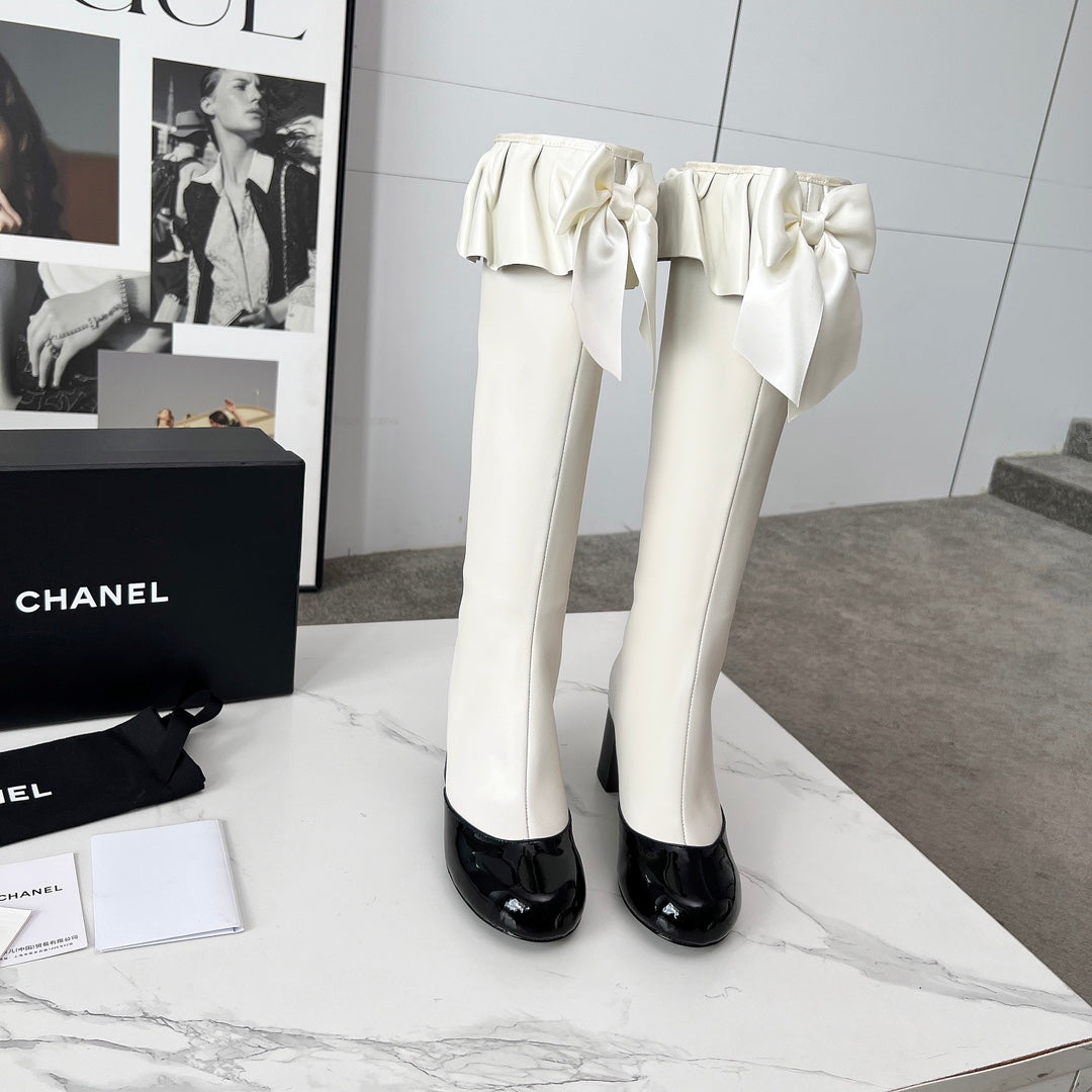 CC 25 high boots white black sheepskin 459457