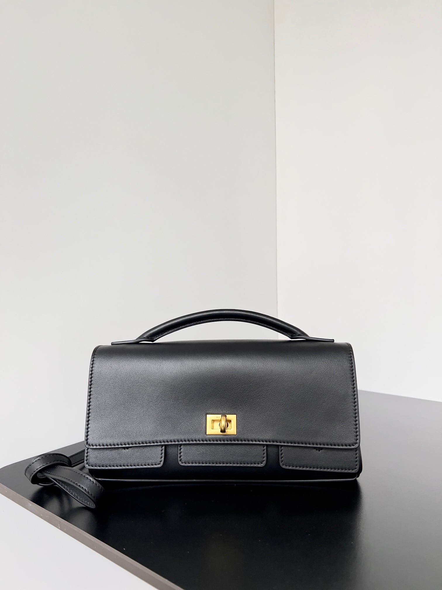 BEL AIR CLUTCH 27 IN BLACK NAPPA LAMBSKIN GOLD HARDWARE