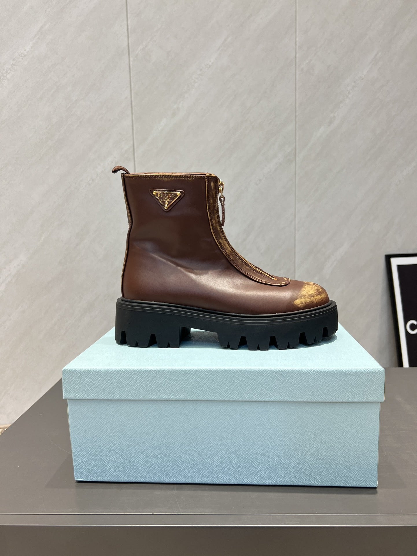 Prada 25 Martin Boots Brown Black Cowhide 501672