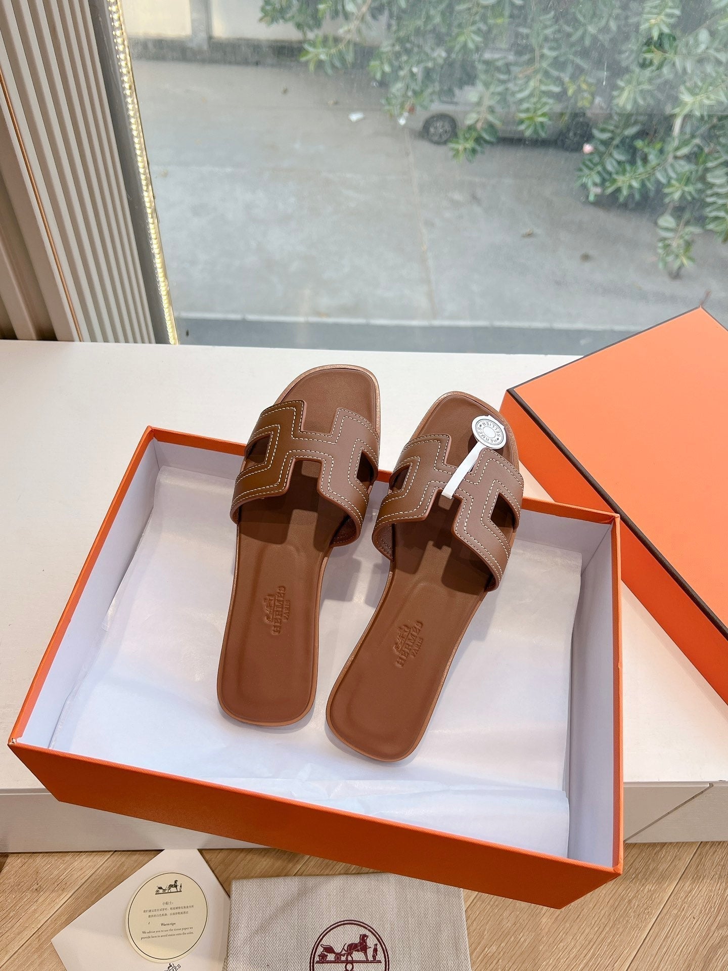 HM 25 Oran Sandal Brown Calfskin White Thread Embroidery