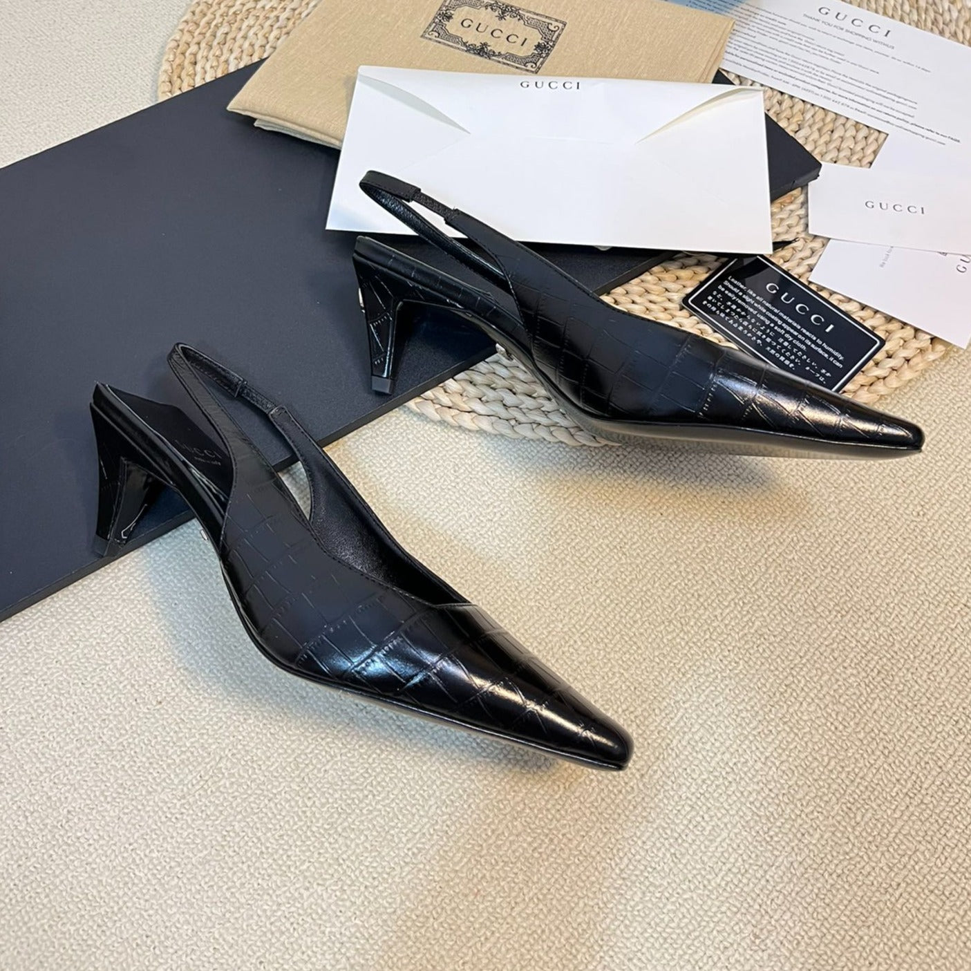 GG Women's G pointed silver-letter Logo slingback Black