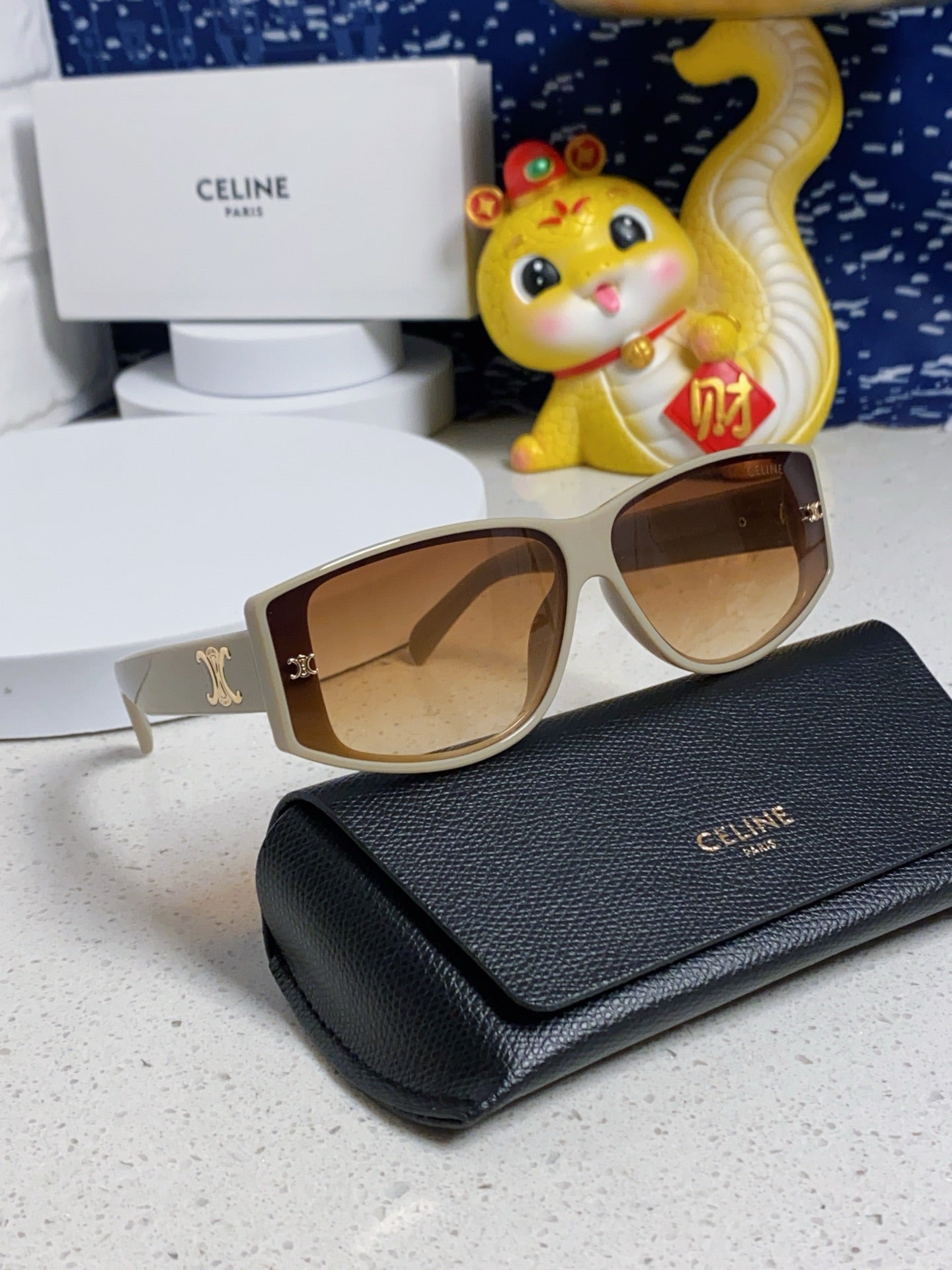 TRIOMPHE SUNGLASS 533218 IN IVORY ACETATE CAMEL LENSES