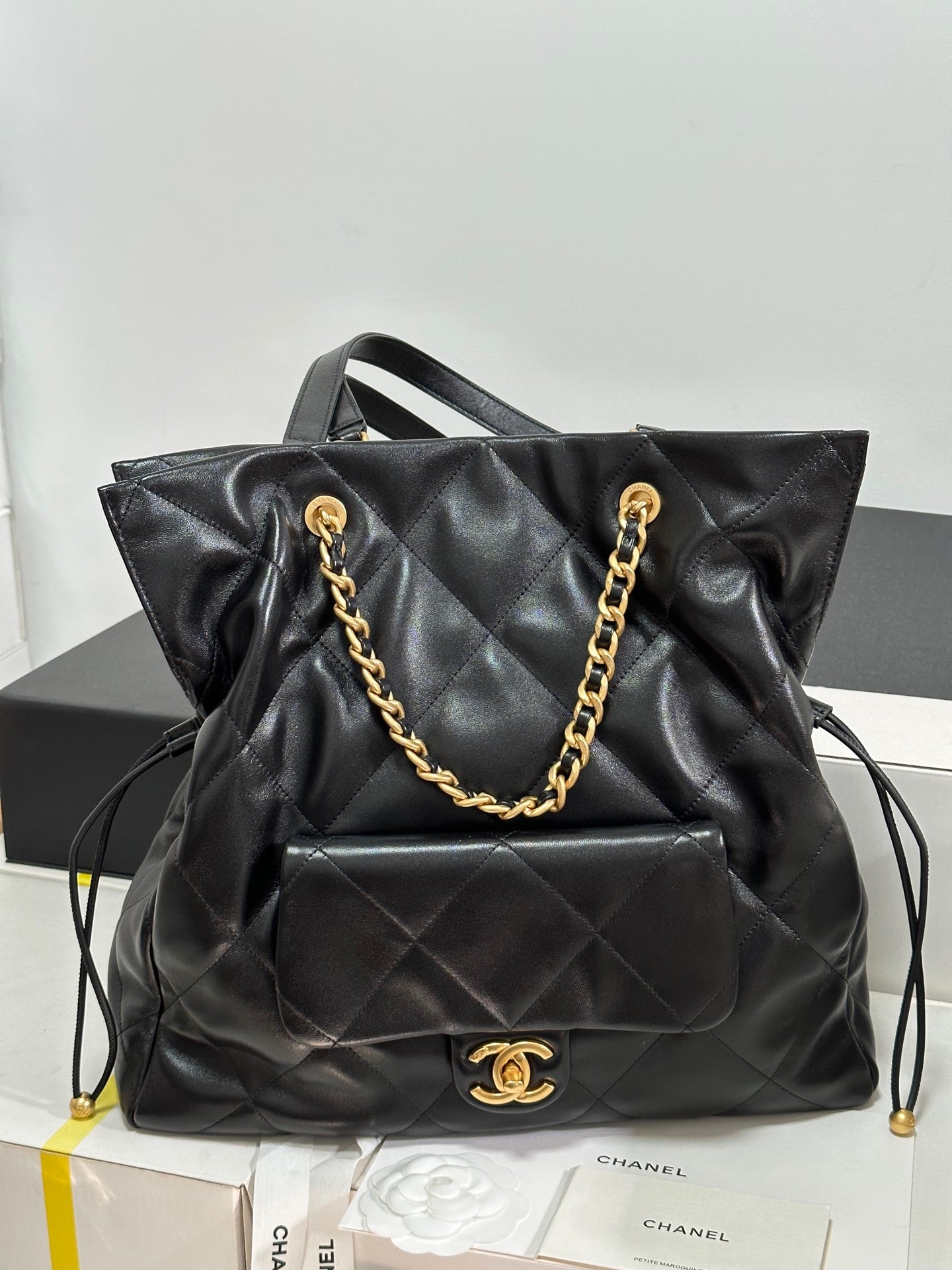 CC 25C Drawstring Backpack Black Lambskin Gold Hardware 243655