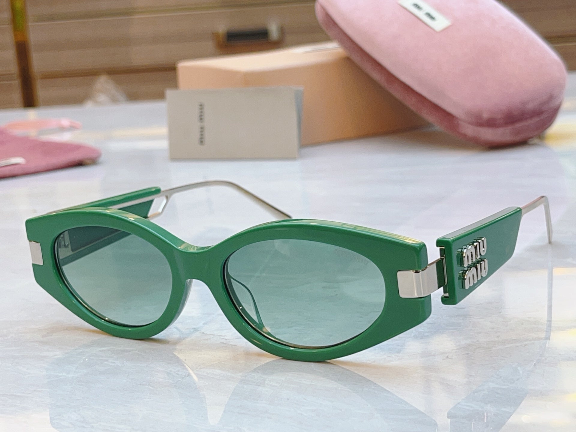 Miumiu Sunglasses 692554