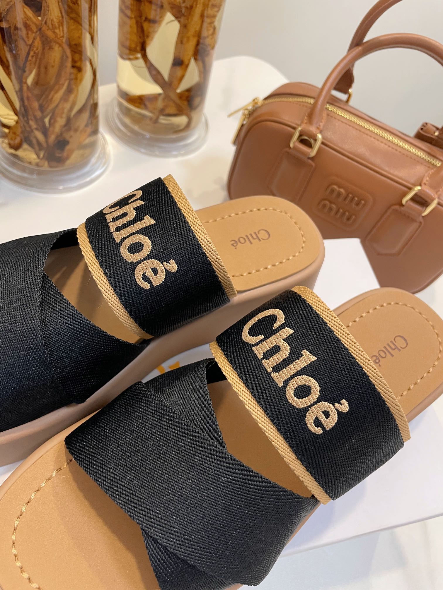 CHLOE WOODY WEDGE SANDALS IN BLACK CANVAS WITH CIDER BROWN RUBBER SOLE