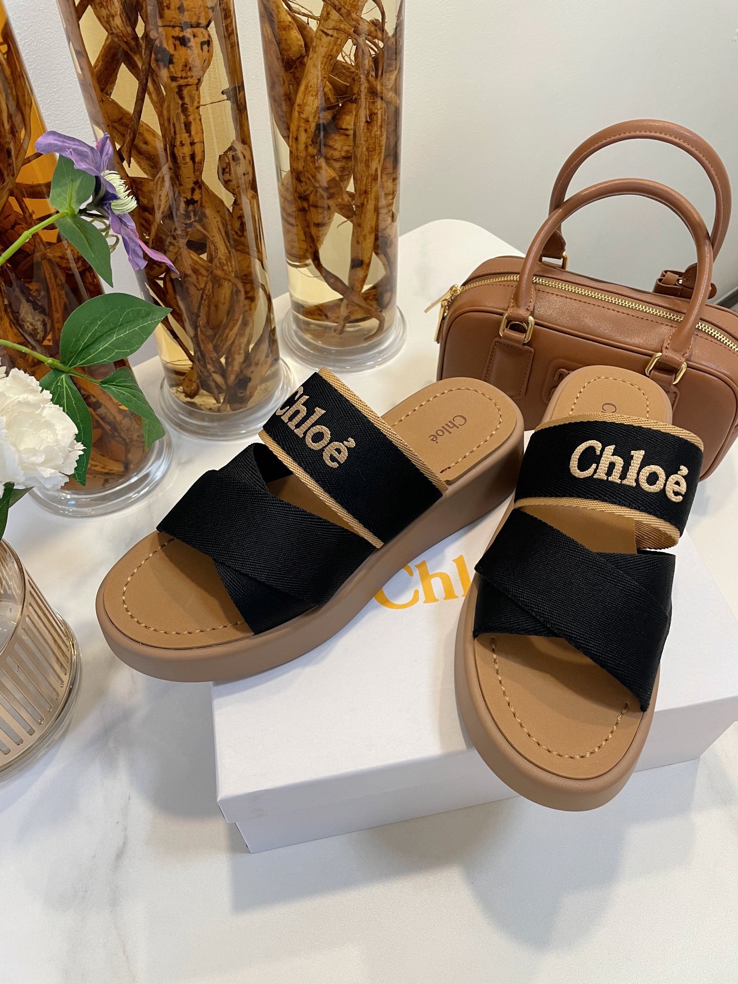 CHLOE WOODY WEDGE SANDALS IN BLACK CANVAS WITH CIDER BROWN RUBBER SOLE