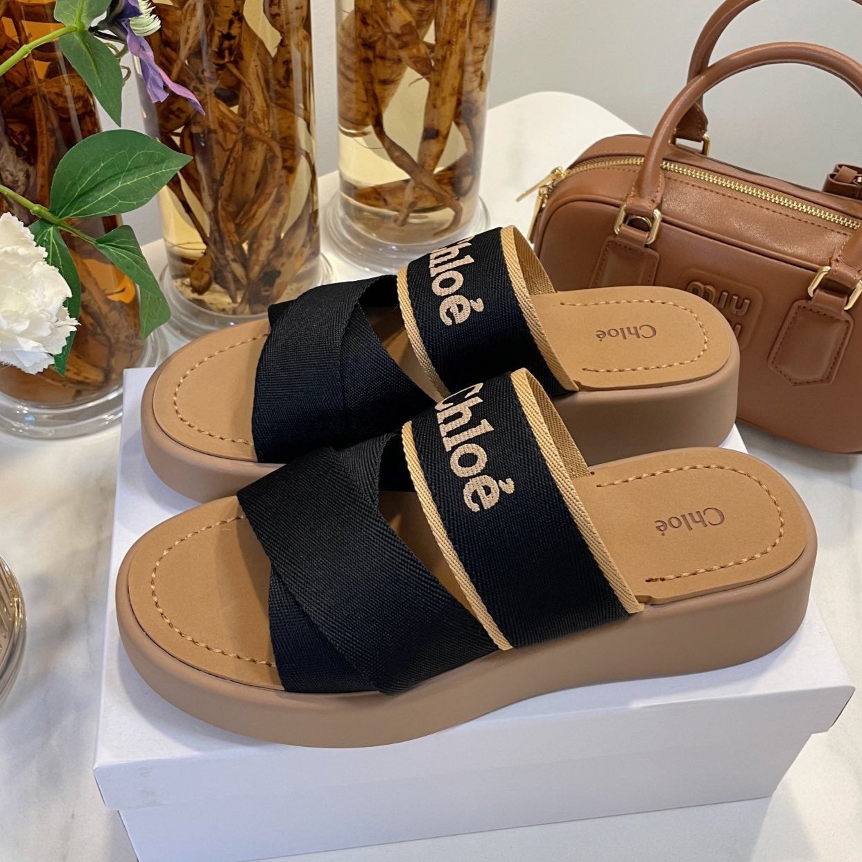 CHLOE WOODY WEDGE SANDALS IN BLACK CANVAS WITH CIDER BROWN RUBBER SOLE