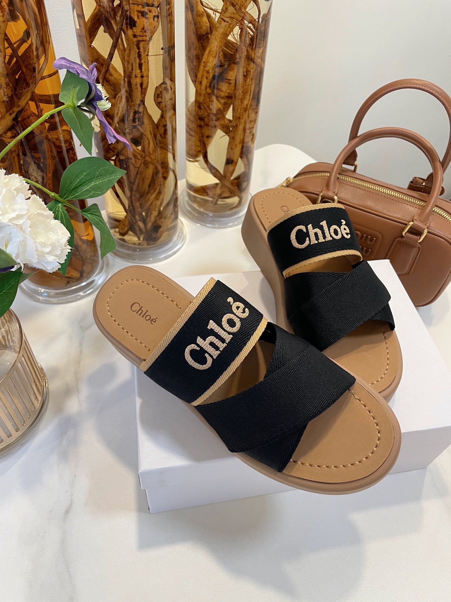 CHLOE WOODY WEDGE SANDALS IN BLACK CANVAS WITH CIDER BROWN RUBBER SOLE