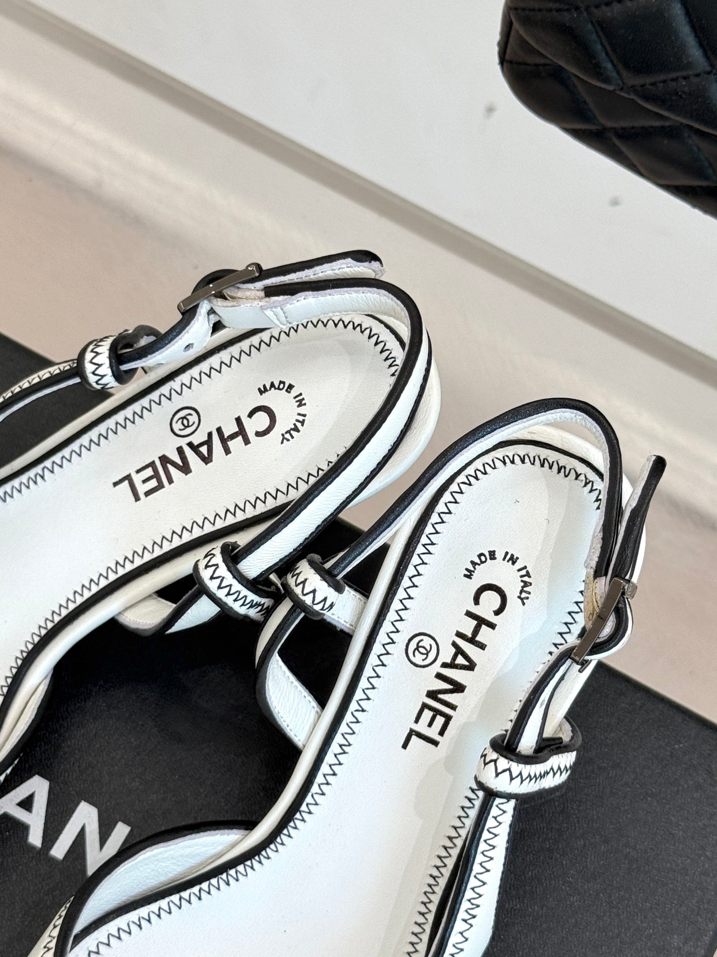 Chanel 25 Slingback White Black Sheepskin 473059