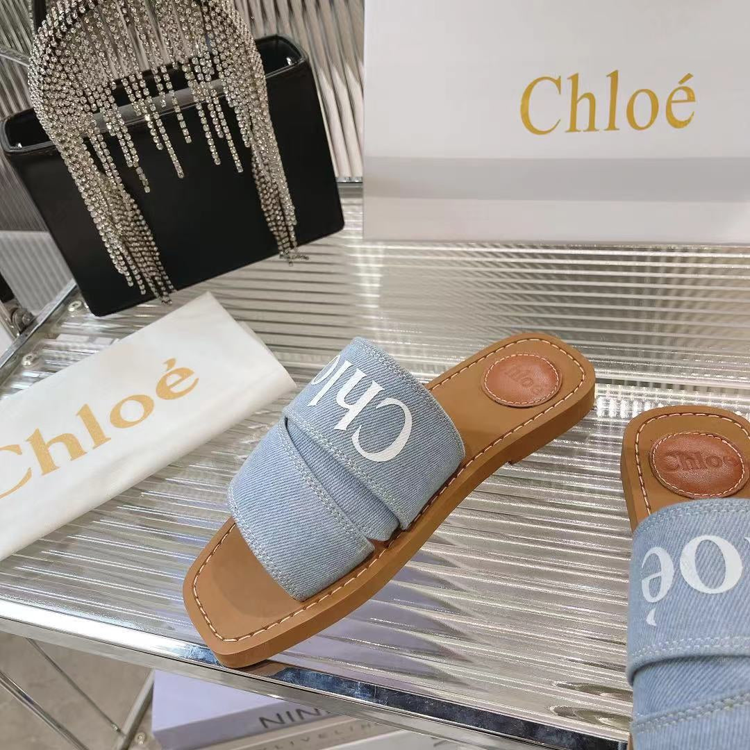 CHLOE WOODY MULE IN LIGHT BLUE DENIM WITH WHITE LOGO