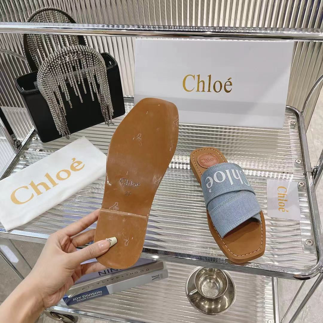 CHLOE WOODY MULE IN LIGHT BLUE DENIM WITH WHITE LOGO