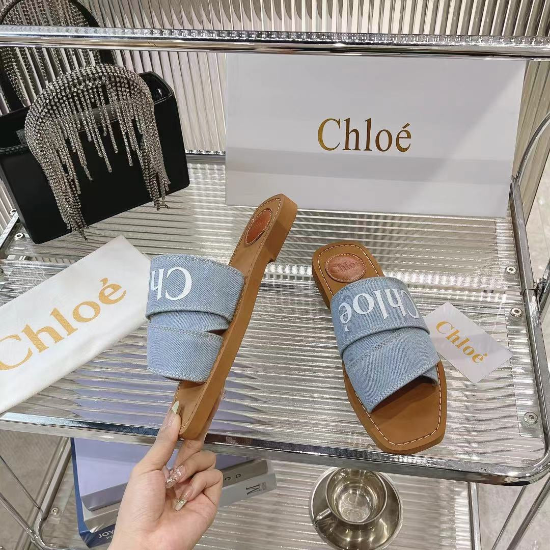 CHLOE WOODY MULE IN LIGHT BLUE DENIM WITH WHITE LOGO