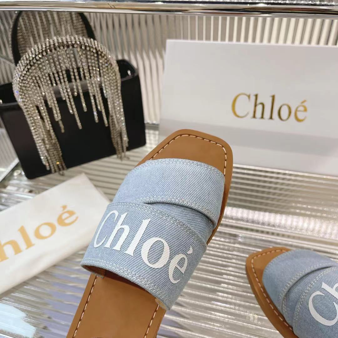 CHLOE WOODY MULE IN LIGHT BLUE DENIM WITH WHITE LOGO