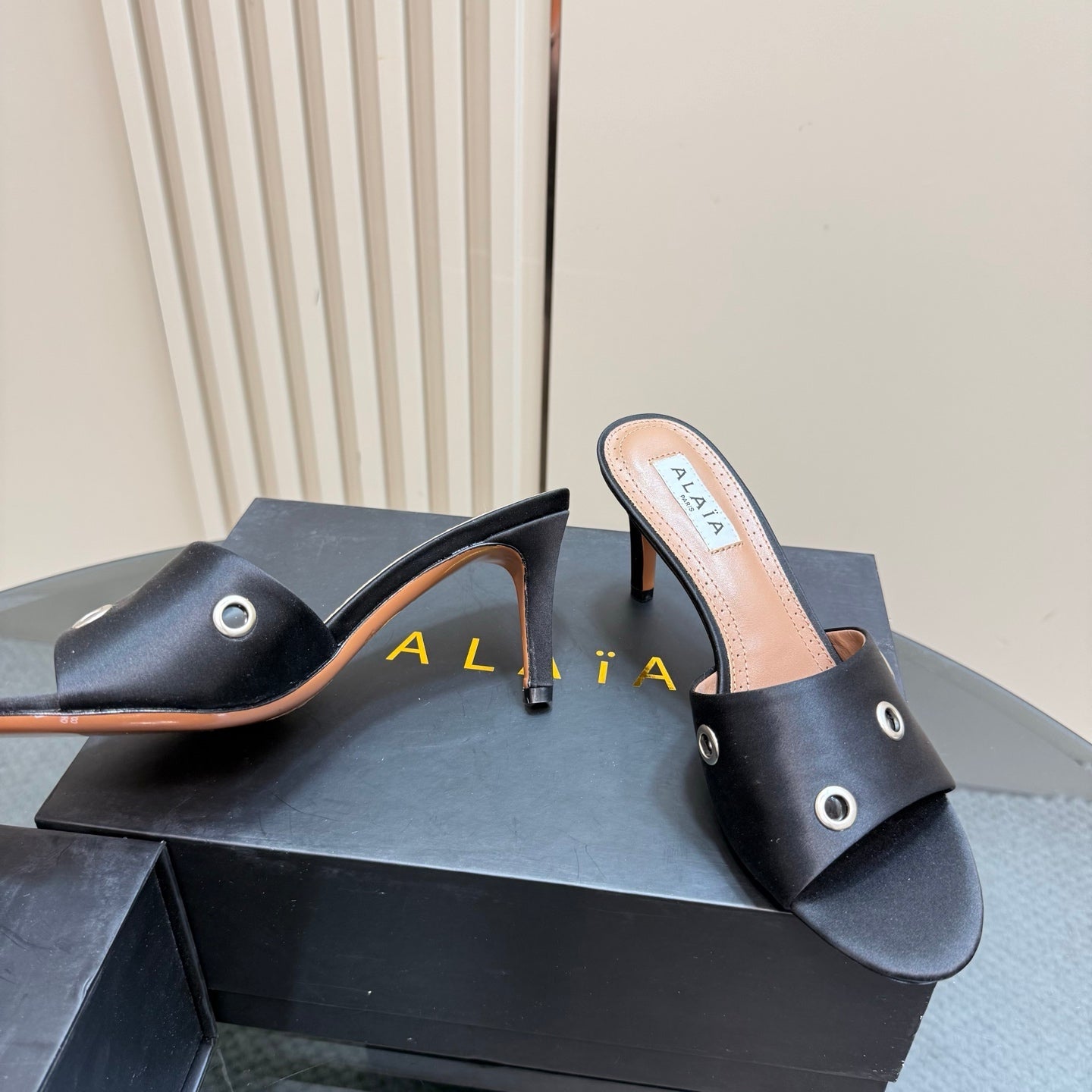 Alaia 2025 Oeillets Embellished Leather Sandals Black Lambskin 299669
