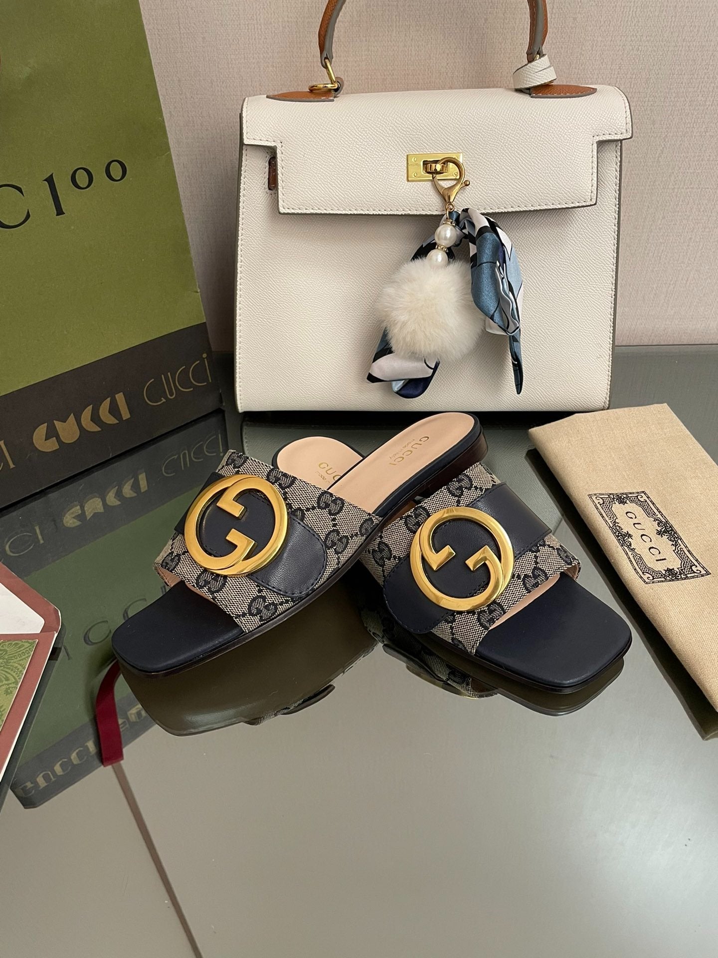 Gucci GG Canvas & Navy Leather Interlocking G Logo Mules